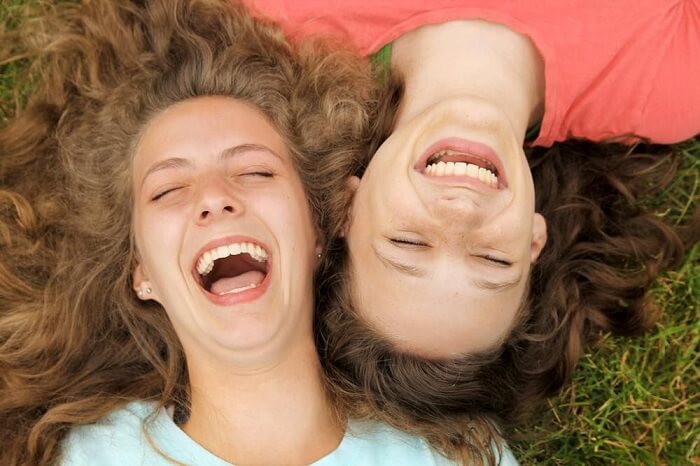 Teens laughing seen from above